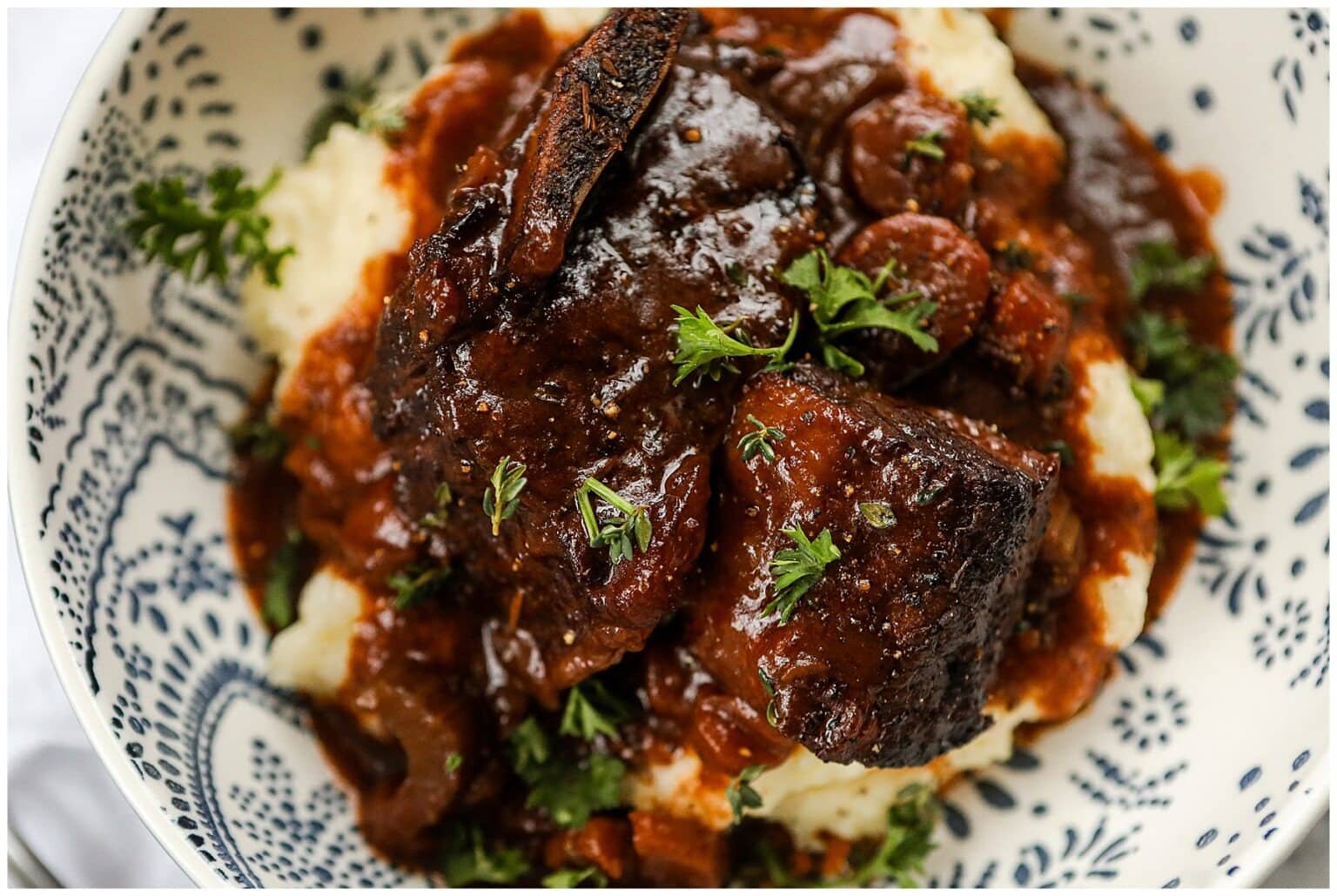 Braised short ribs served on top of mashed potatoes. 