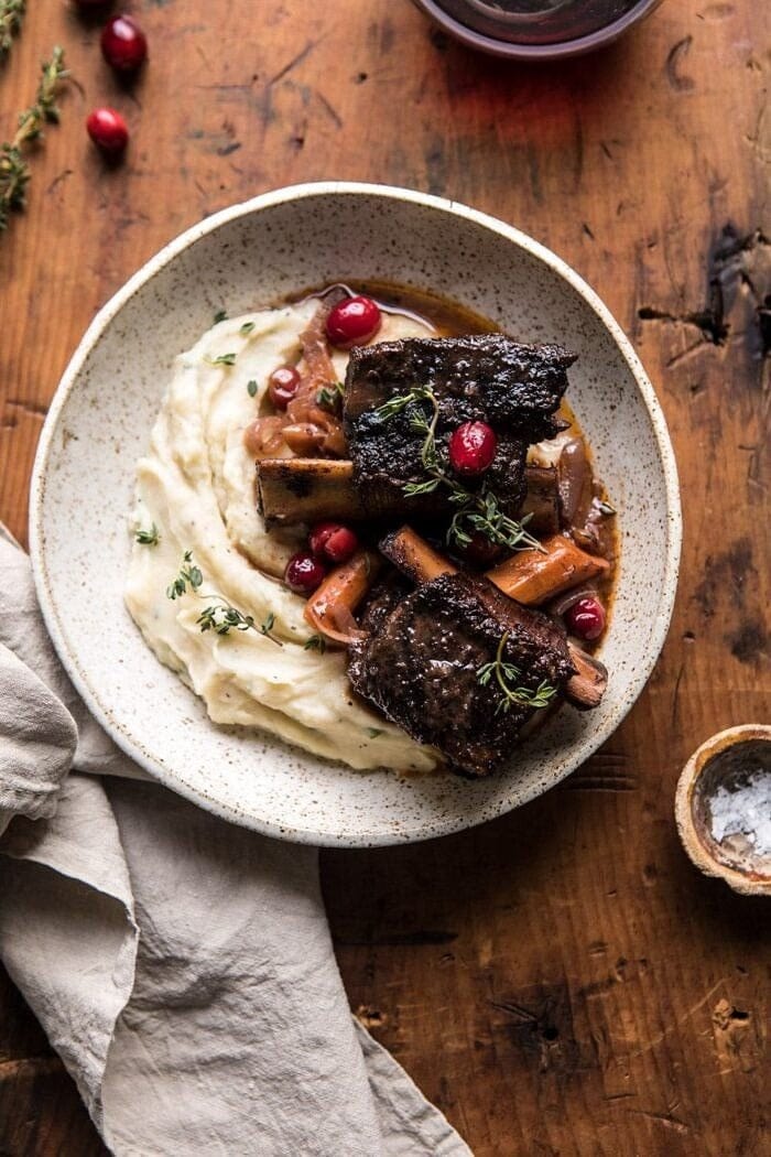 Red wine cranberry braised short ribs topped on mashed potato. 