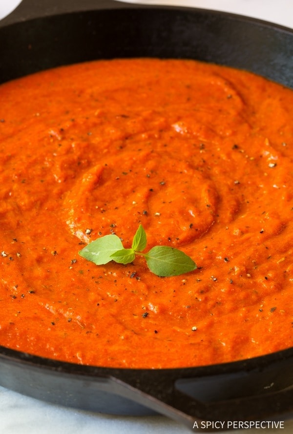 Roasted red pepper marinara sauce on a skillet.