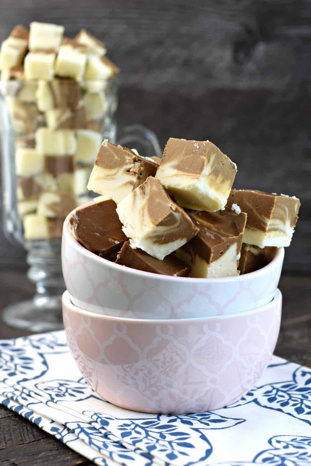 Bunch of fudge in a bowl made with With white chocolate and marshmallow cream.