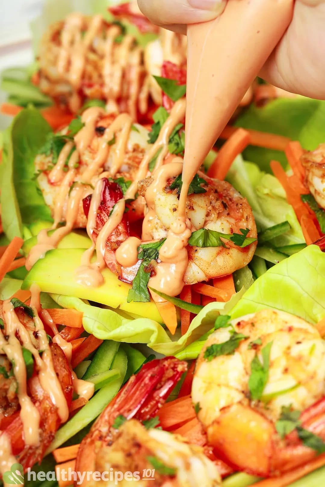 Healthy shrimp lettuce wraps with avocados, lettuce and veggies