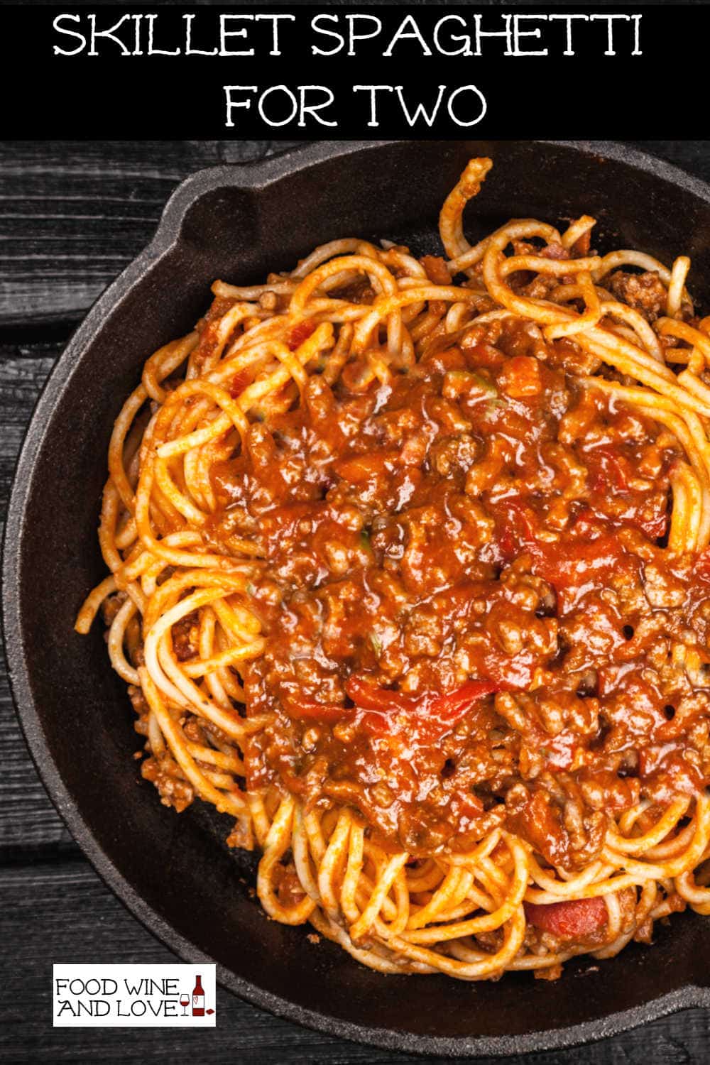 Spaghetti topped with extra meaty sauce served in skillet. 