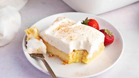 A Slice of Homemade Sweet Pastel de Tres Leches in a Plate