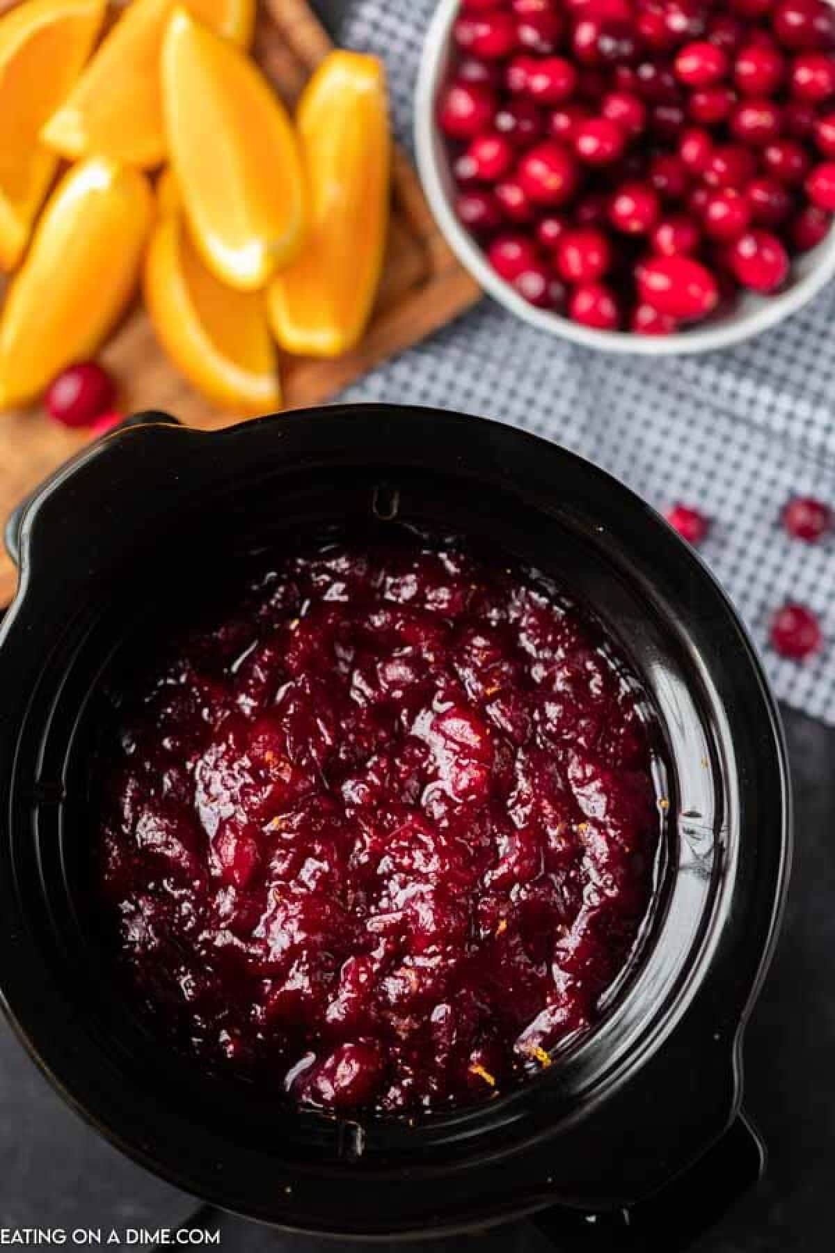 Cranberry sauce cooked on a slow cooker.