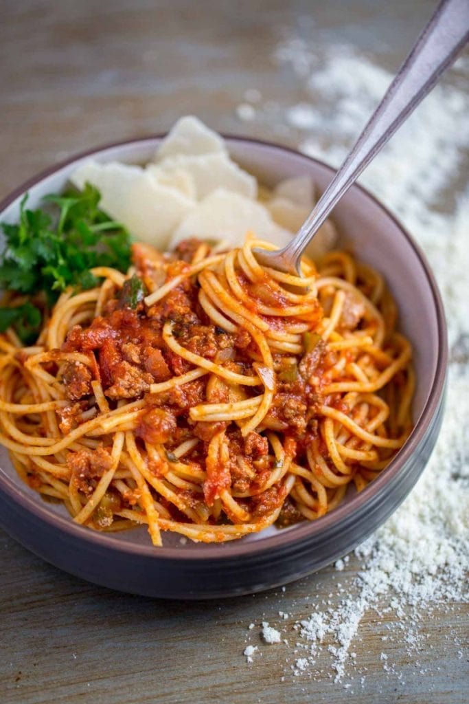 Meaty spaghetti with Tomatoes, ground beef, Italian sausage, veggies, and spices.