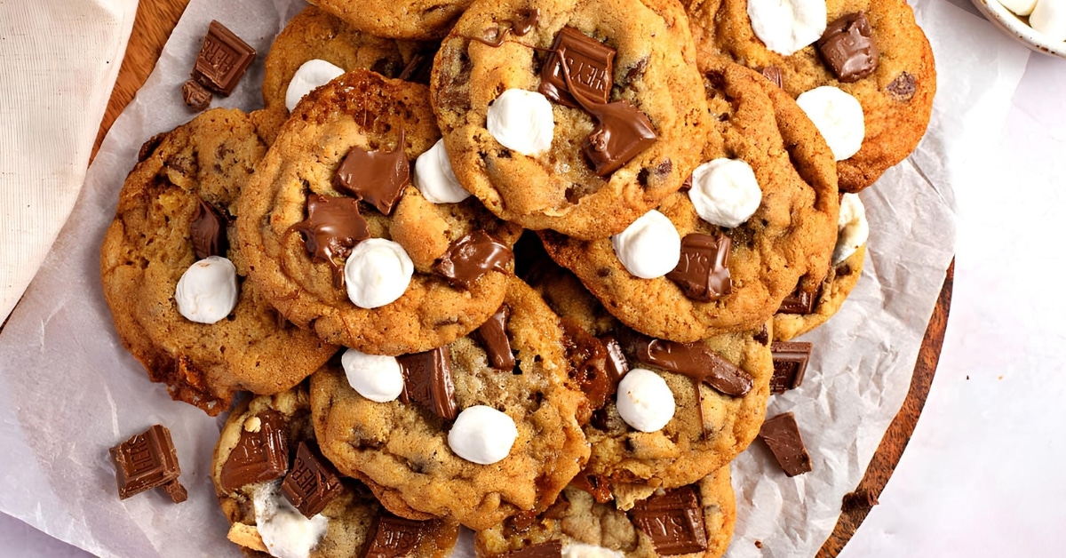 S'mores Cookies with melted chocolate bars and marshmallows.