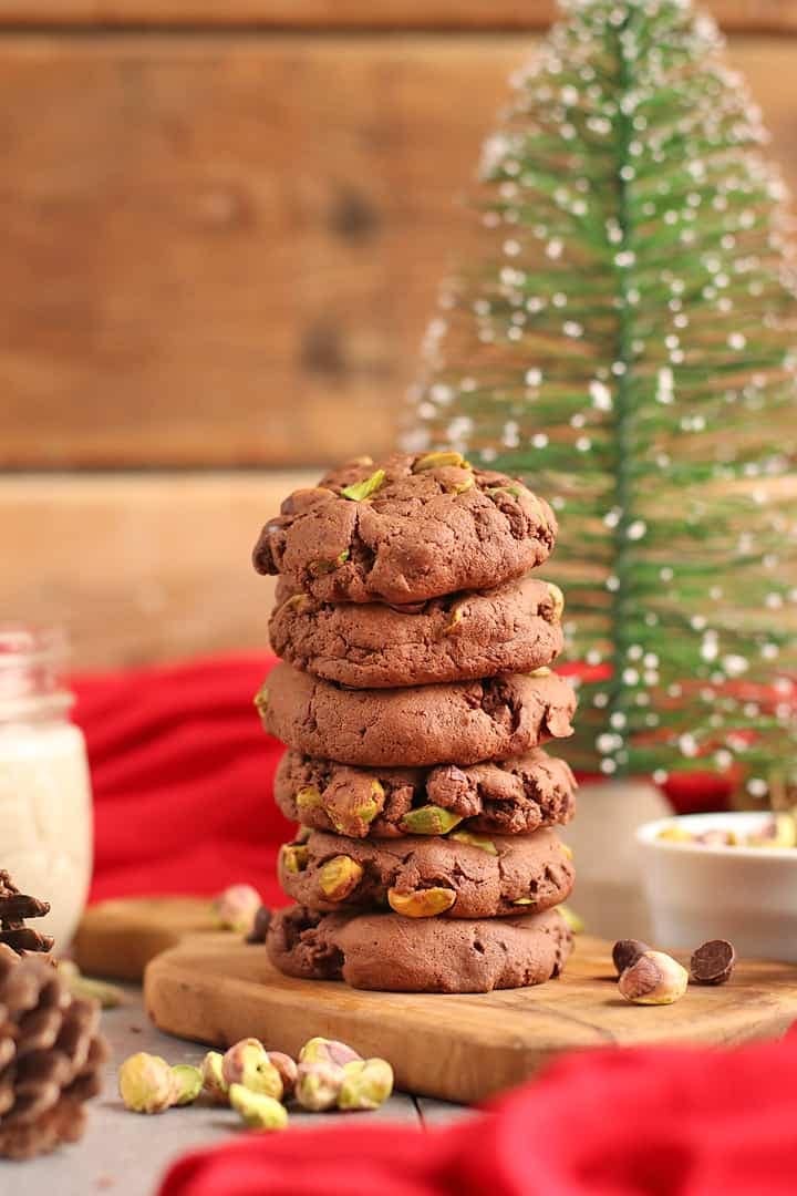 Stack of chocolate chip cookies with pistachios. 