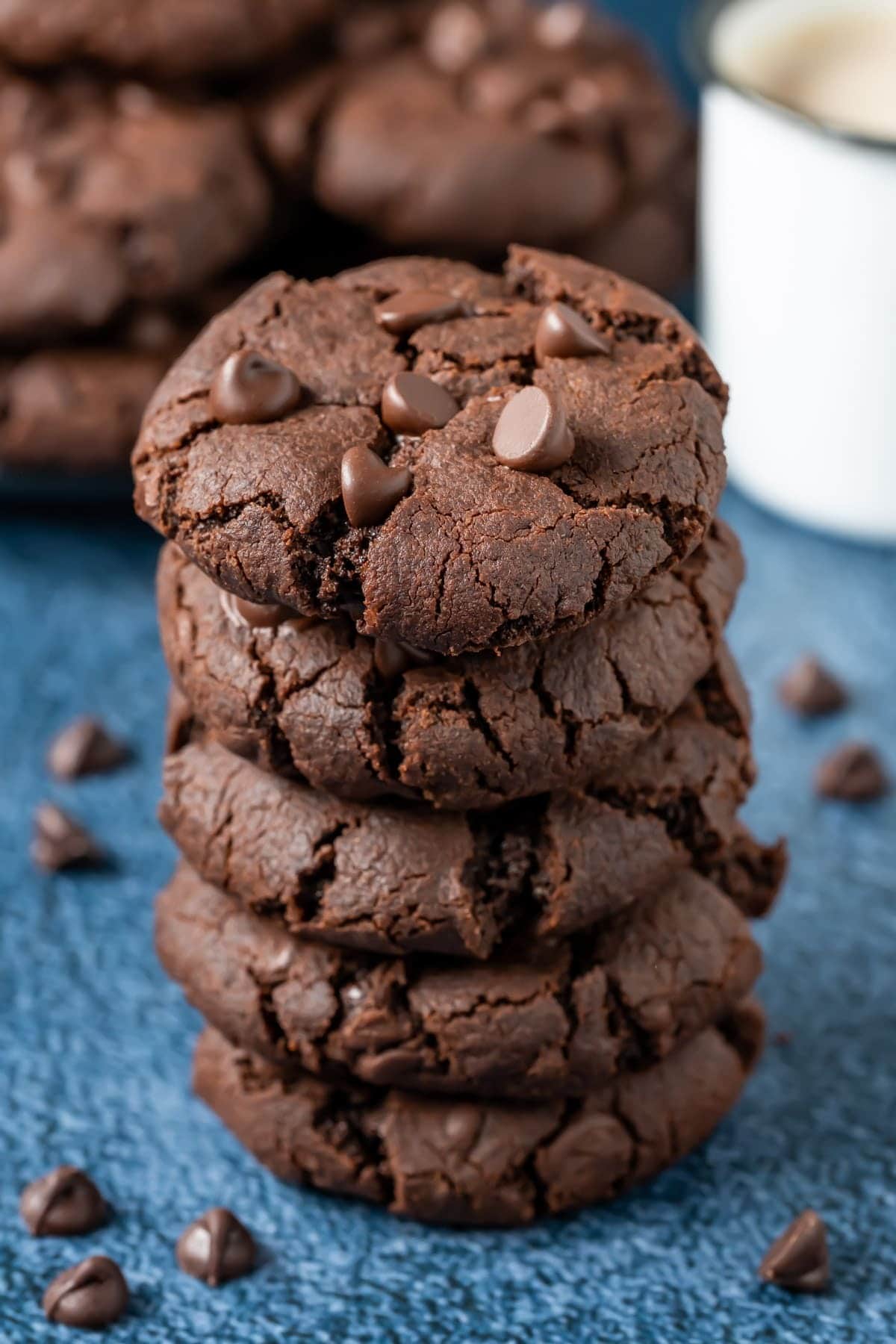 Stack of chocolate cookies with sprinkles of mini chocolate chips. 