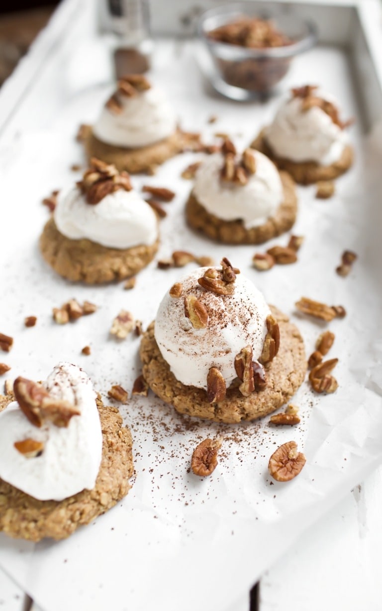 Pecan pie cookies topped with whipped cream.