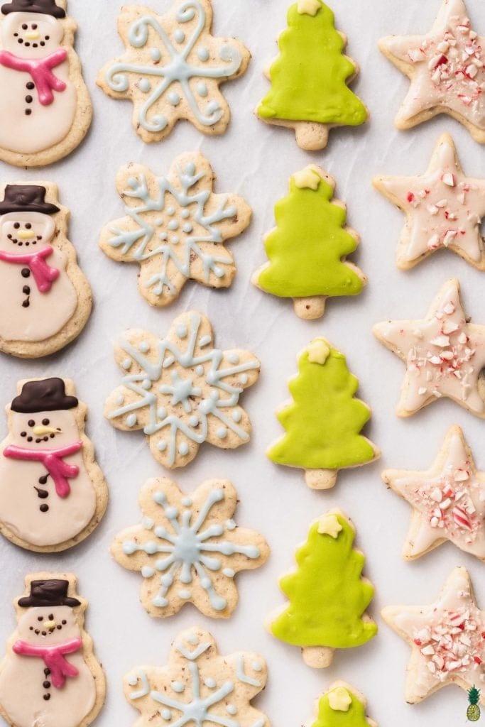 Snowman, Christmas tree, star and mistletoes inspired decorated cookie cutters. 