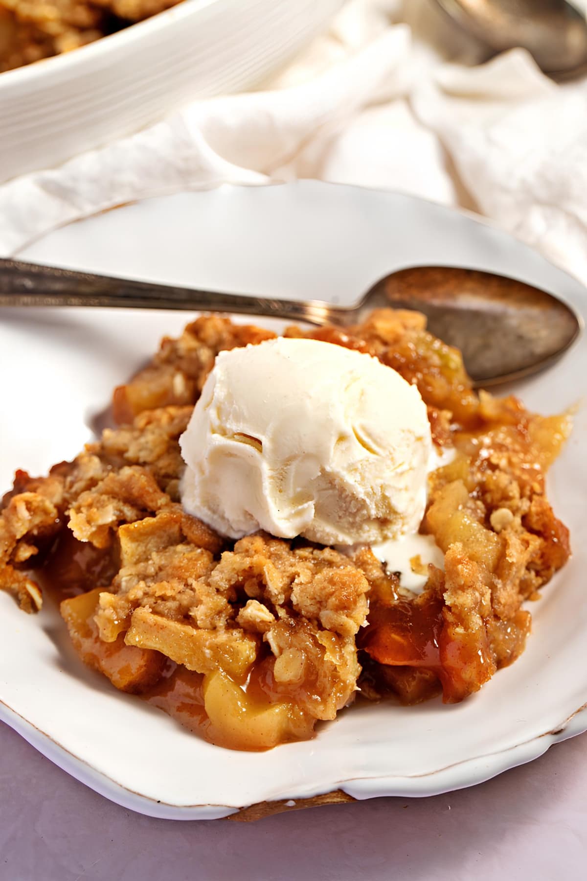 Apple Crumble with a scoop of vanilla ice cream on top