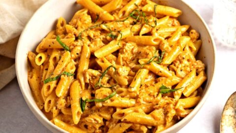 Bowl of Creamy Cajun Chicken Pasta with Herbs