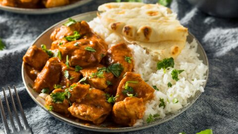 Tikka Masala in a Plate Served with Rice and Naan Bread