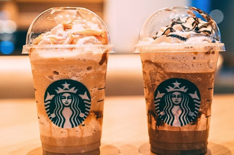 Chocolate Starbucks drinks on a wooden table.