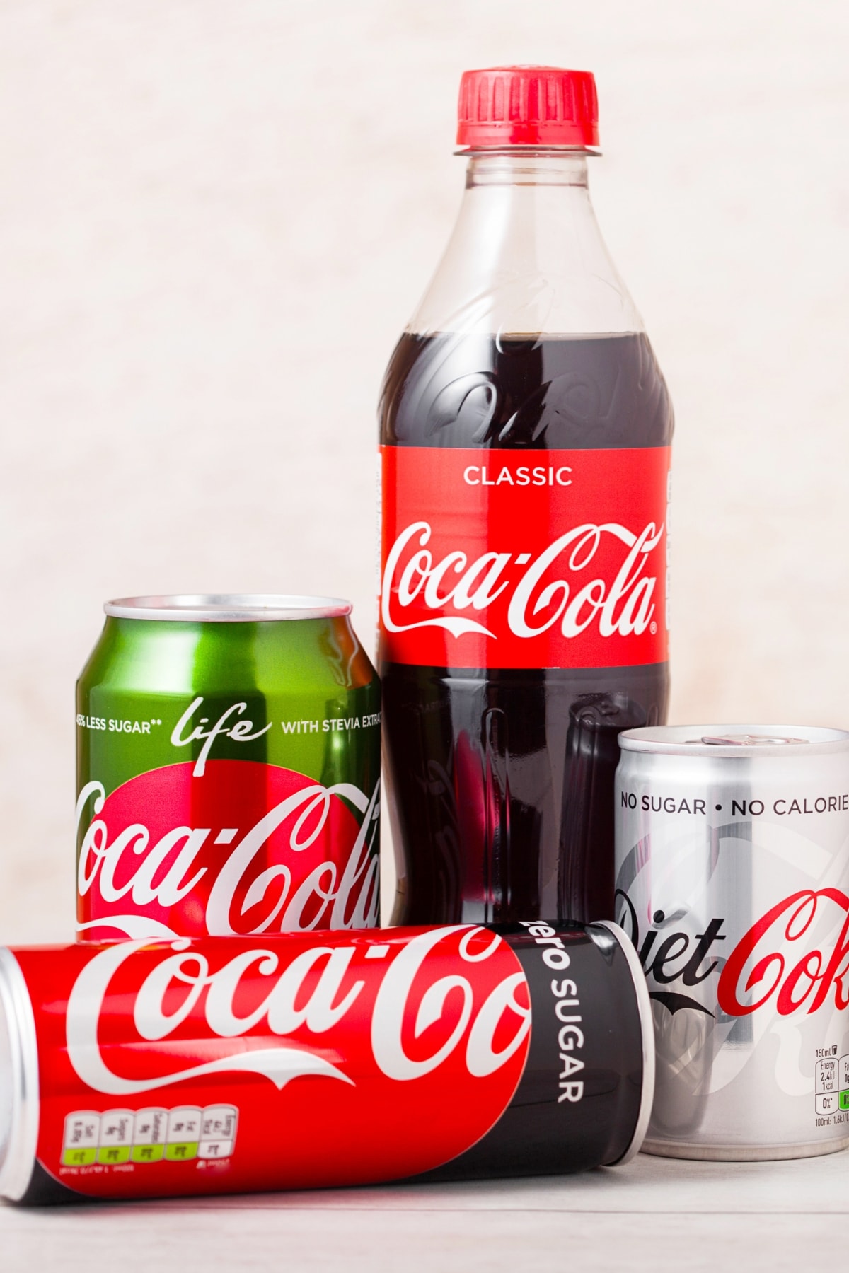 Different flavors of Coca Cola in can and bottle. 