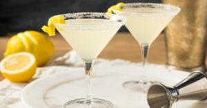 Two glasses of lemon drop martini in wine glasses