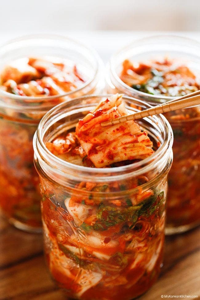 Kimchi on jar glasses. 