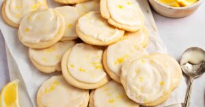 Sweet Homemade Lemon Shortbread Cookies with Glaze on a Parchment Paper
