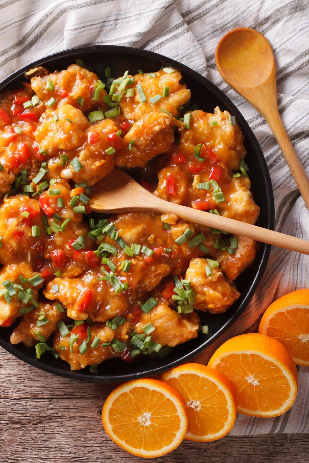 Orange Chicken with Creamy Sauce, Topped with Green Onions and Chili