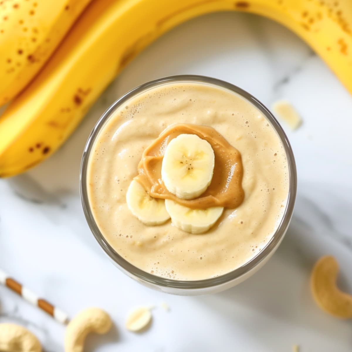 Refreshing homemade peanut butter banana smoothie, top view