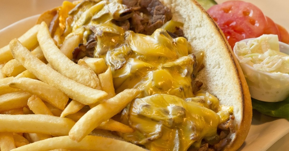 Philly Cheesesteak served with fries