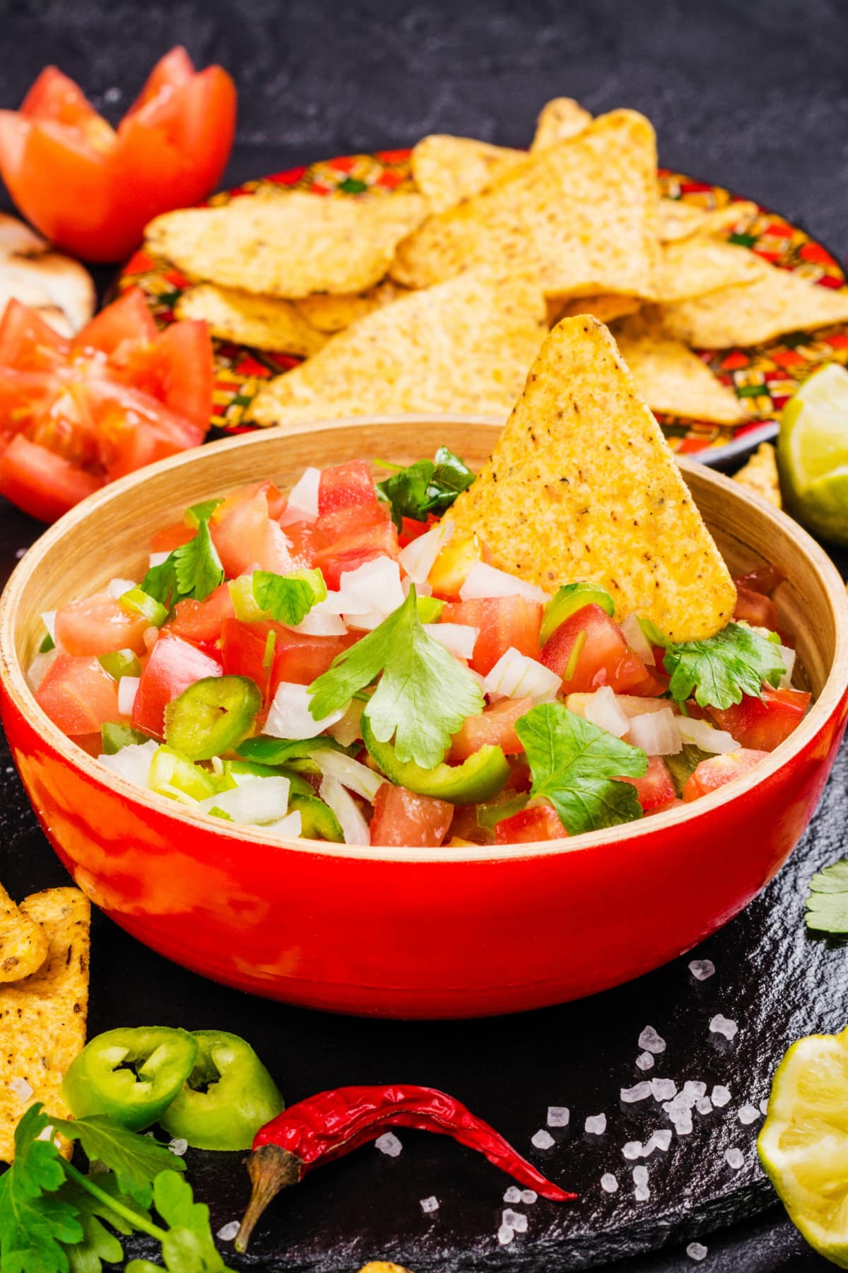 Diced tomatoes, onions, cilantro, and jalapenos mixed together and served with nachos.