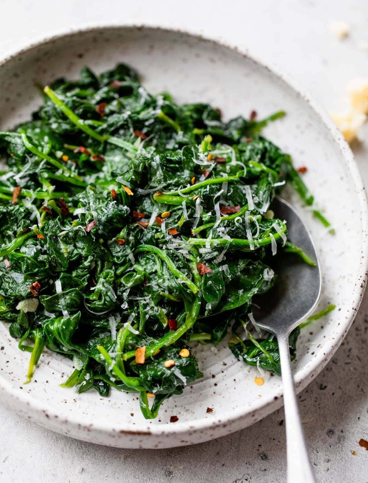 Sauteed spinach on plate.
