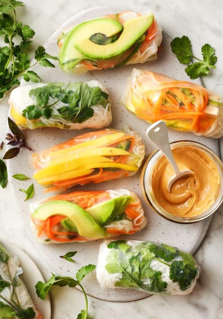 Spring rolls served with peanut sauce.