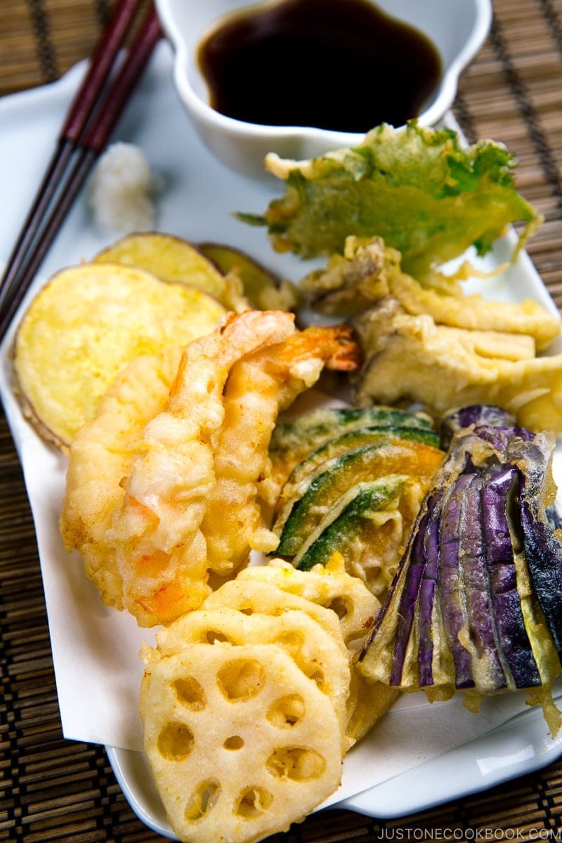Tempura served with deep fried eggplant thinly sliced Japanese sweet potato, and shiso leaves dunked in batter.