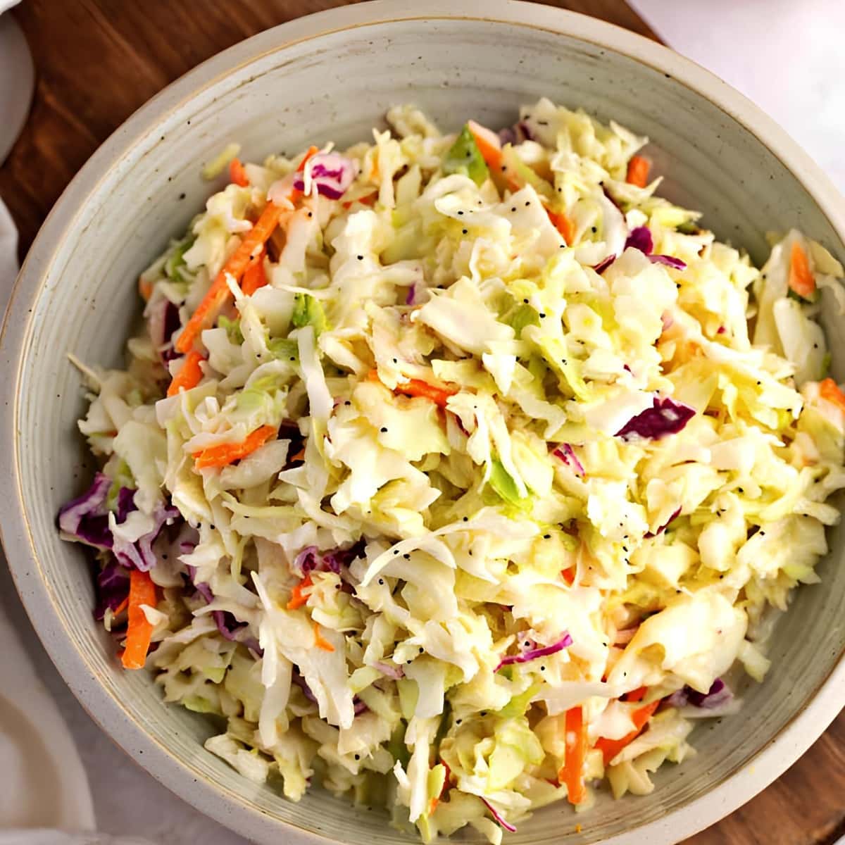 Top view of coleslaw mix on a bowl. 