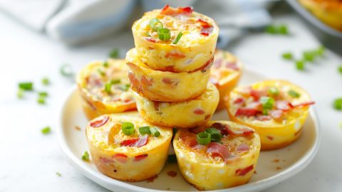 A plate with a stack of mini egg bites, a delicious breakfast option