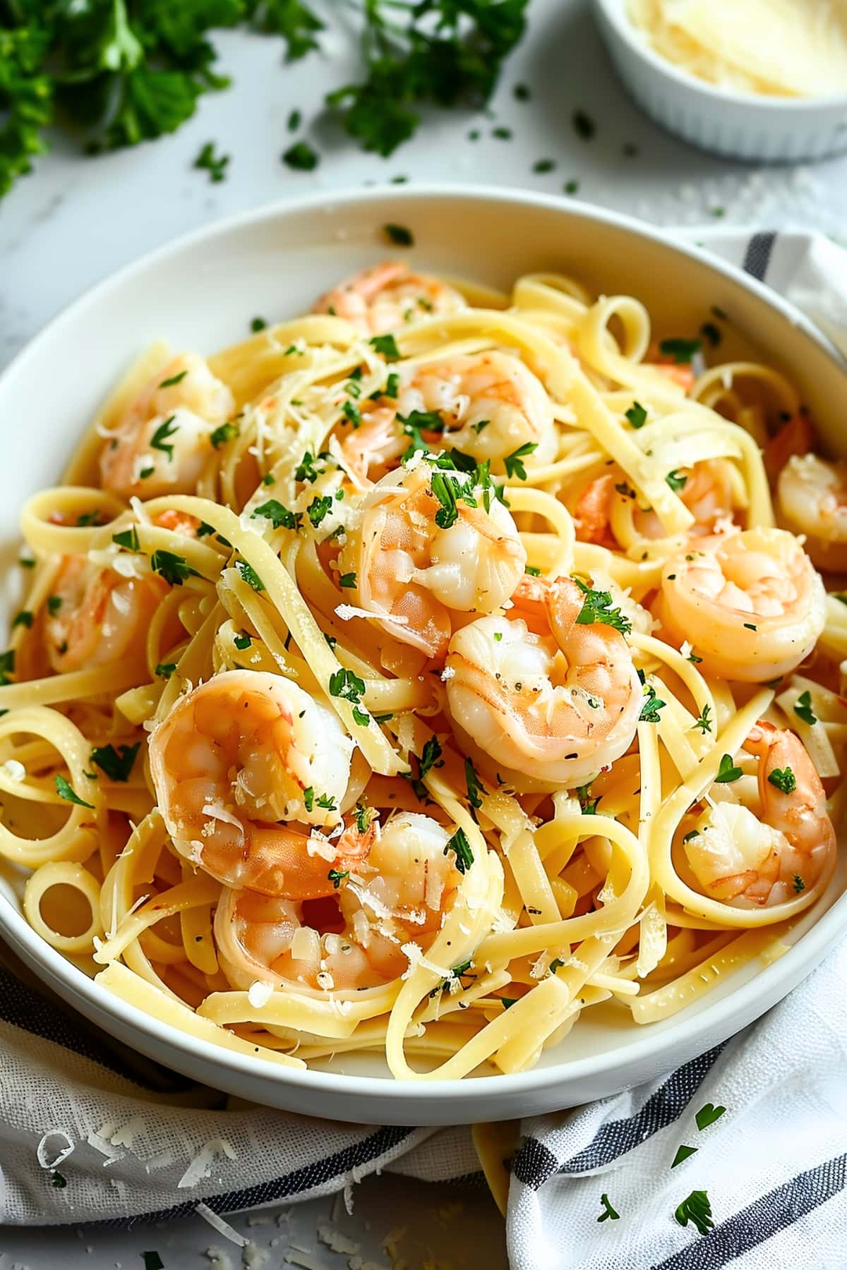 Shrimp linguine pasta with parsley and parmesan cheese, perfect for every occasion