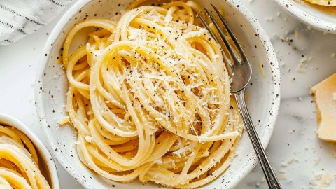 Top View of Cacio e Pepe in a Bowl with a Fork