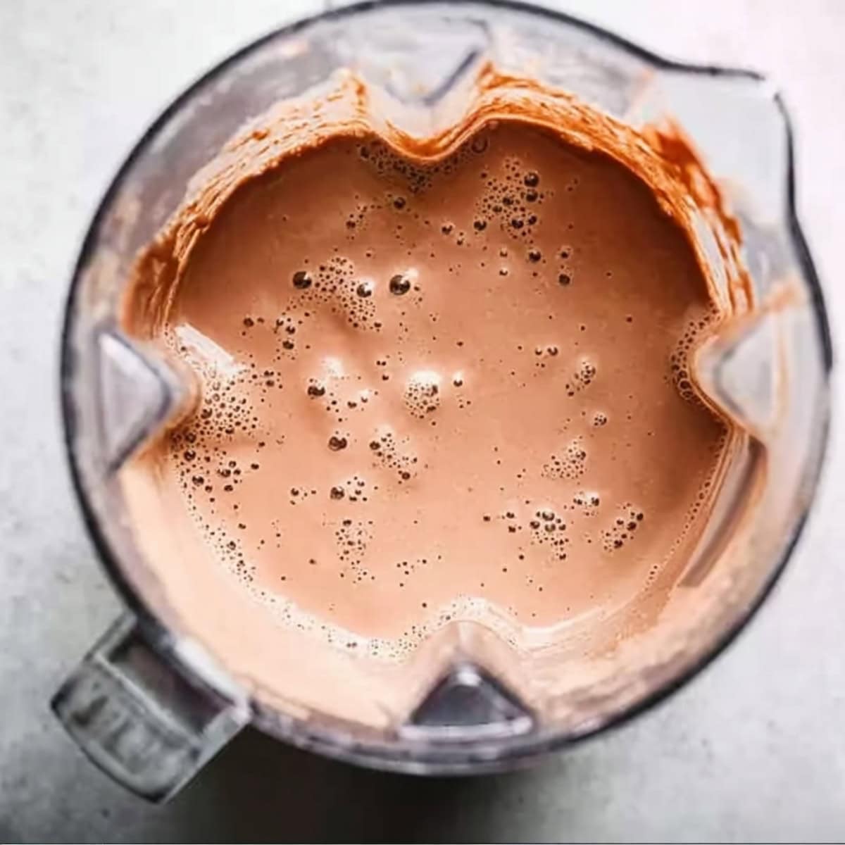 Chocolate milkshake in a blender.