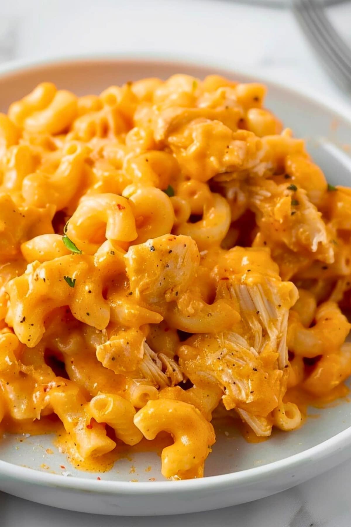 Buffalo Mac and cheese on a plate.