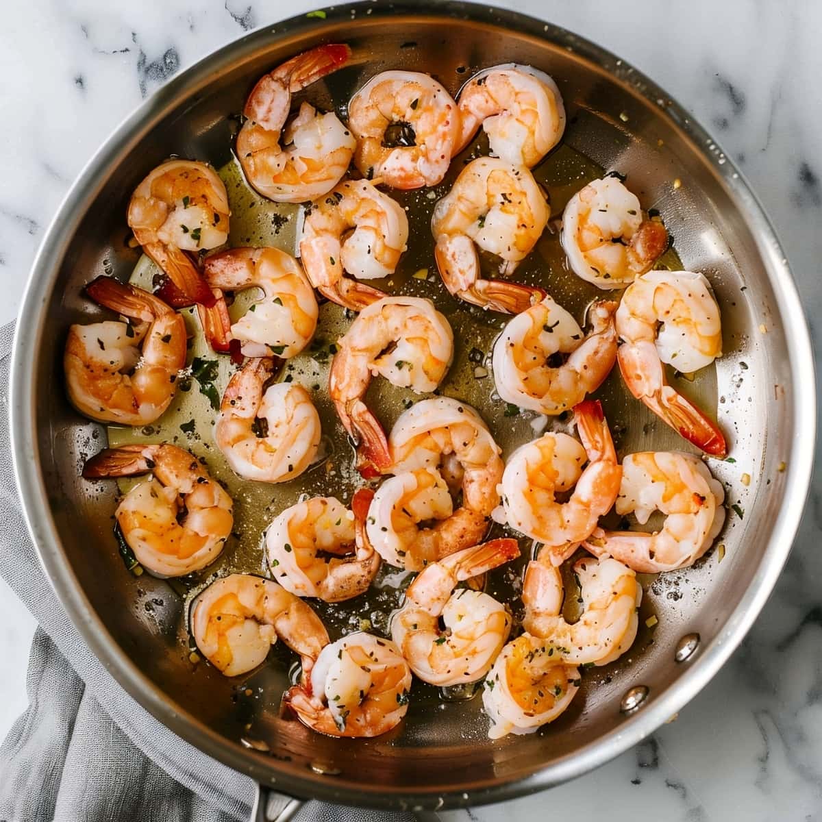 Homemade cooked shrimp in a pan, top view