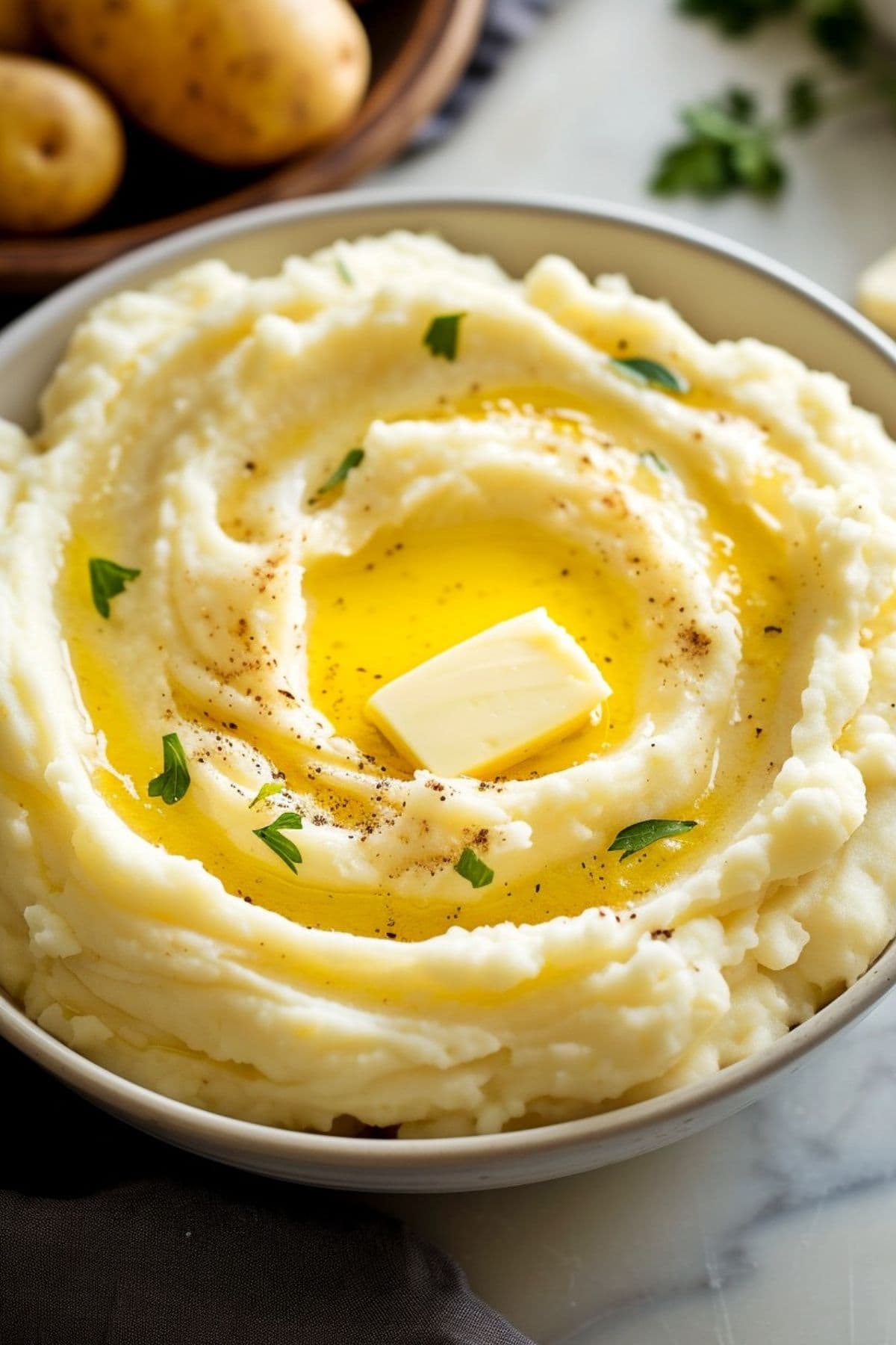 Homemade mashed potatoes with chives and butter