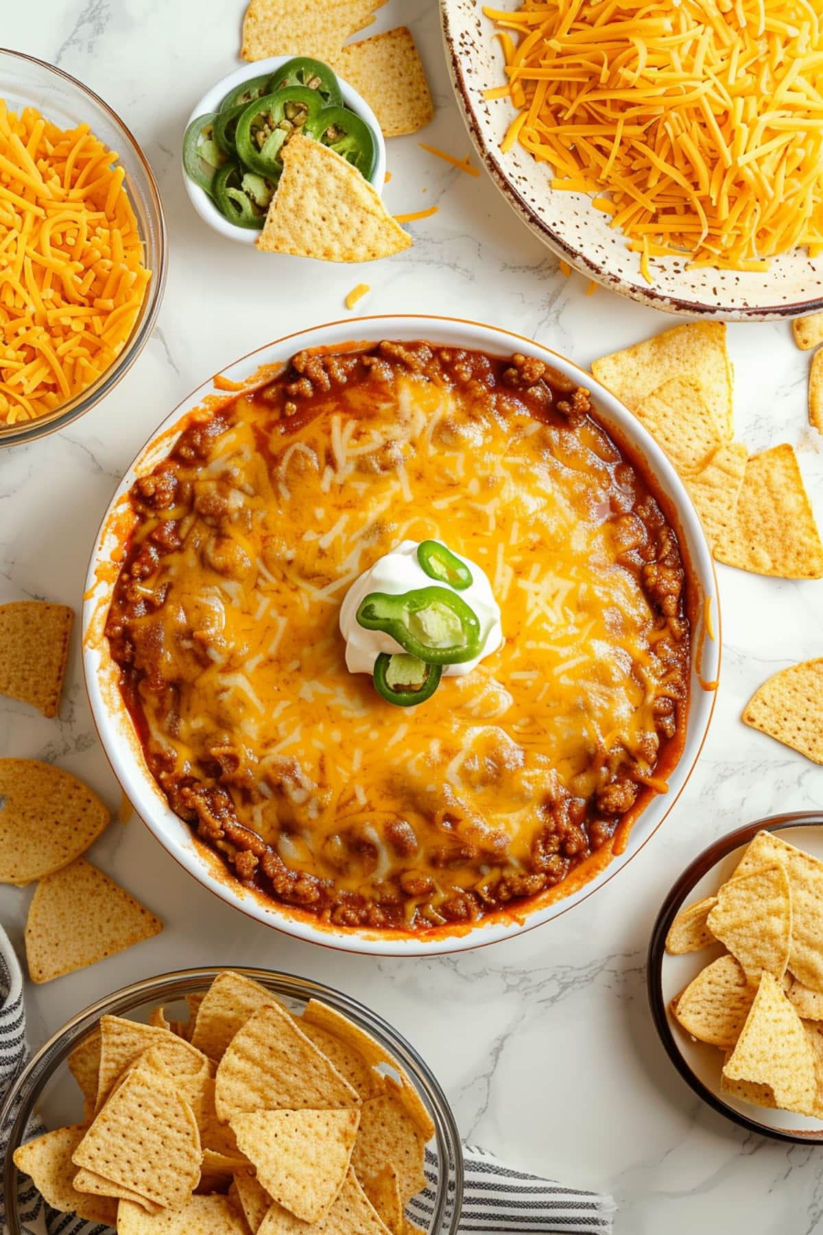 Hormel chili dip with ground beef topped with cream cheese and jalapeno 