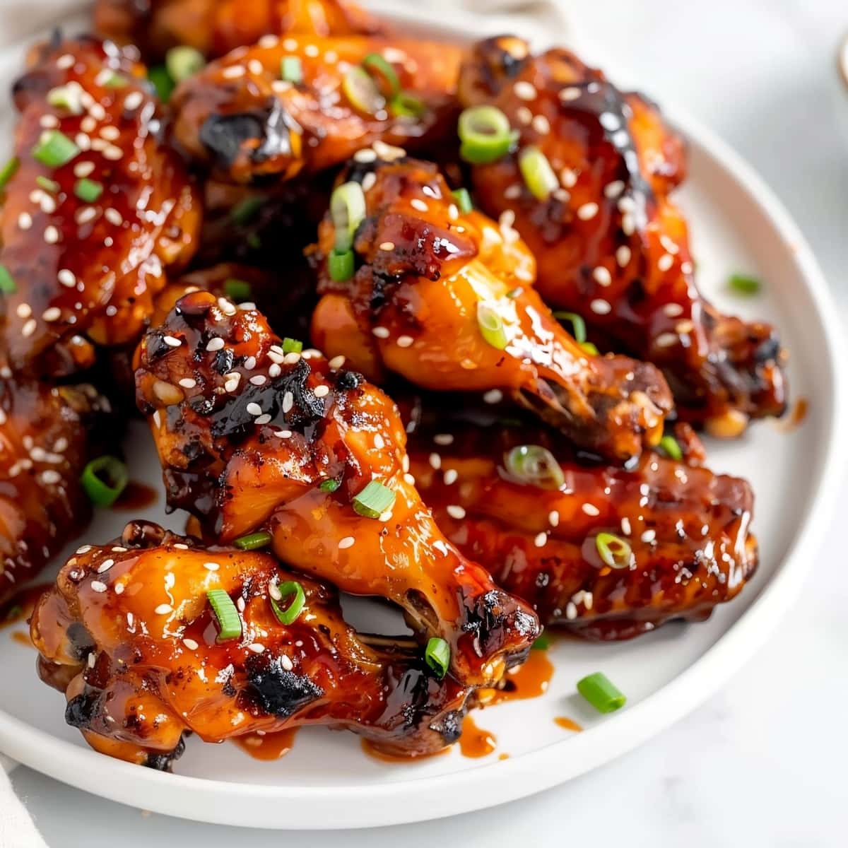 Homemade Korean chicken wings with sesame seeds and chopped green onions