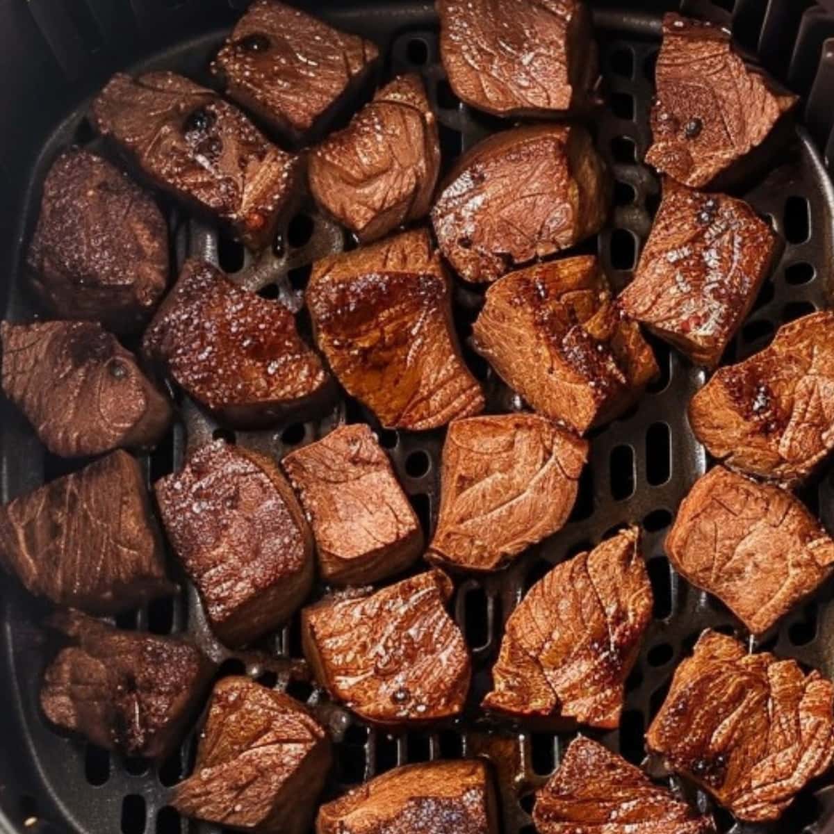 Steak bites in an air fryer.