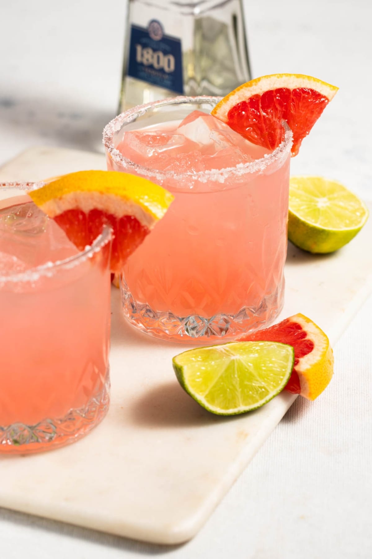 Homemade sweet and boozy paloma cocktail with grapefruit juice