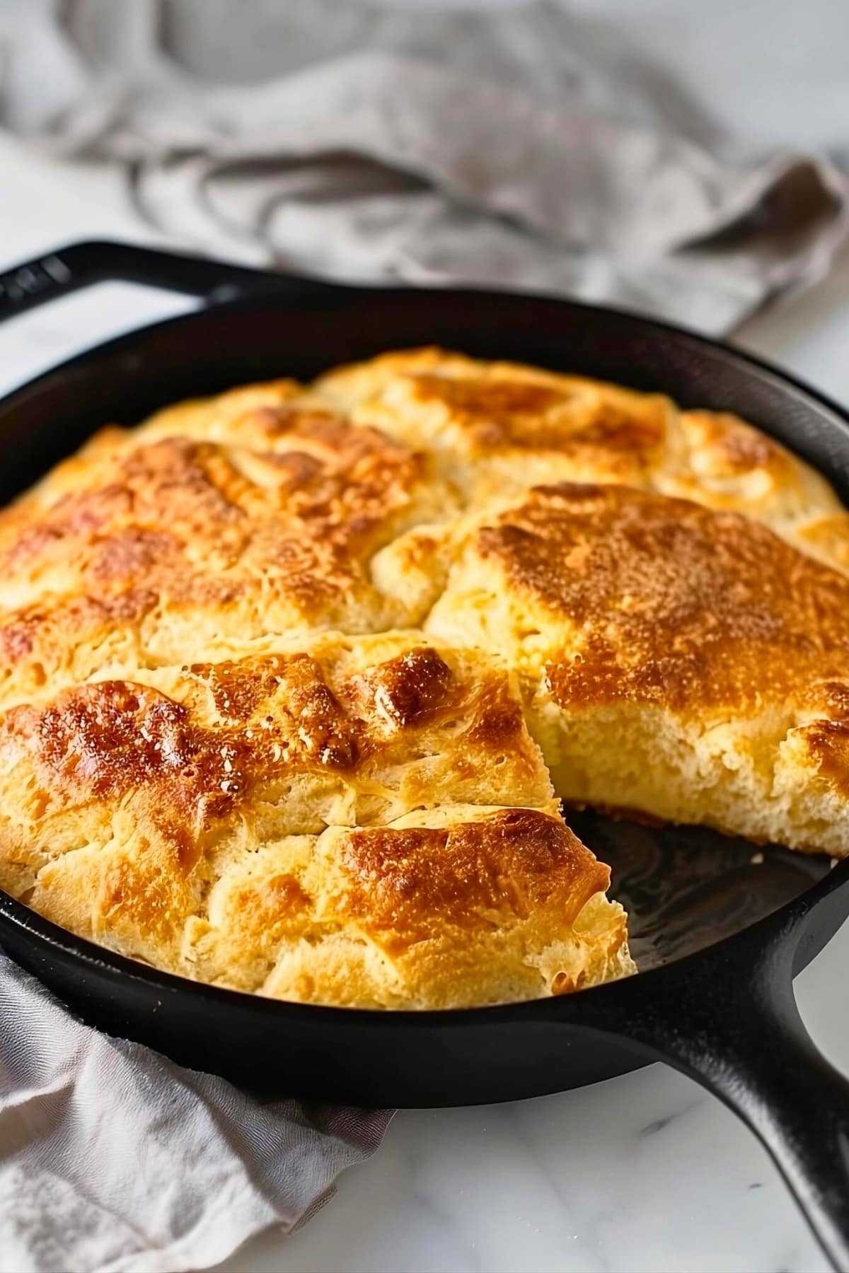 Biscuit bread cooked in an cast iron skillet.