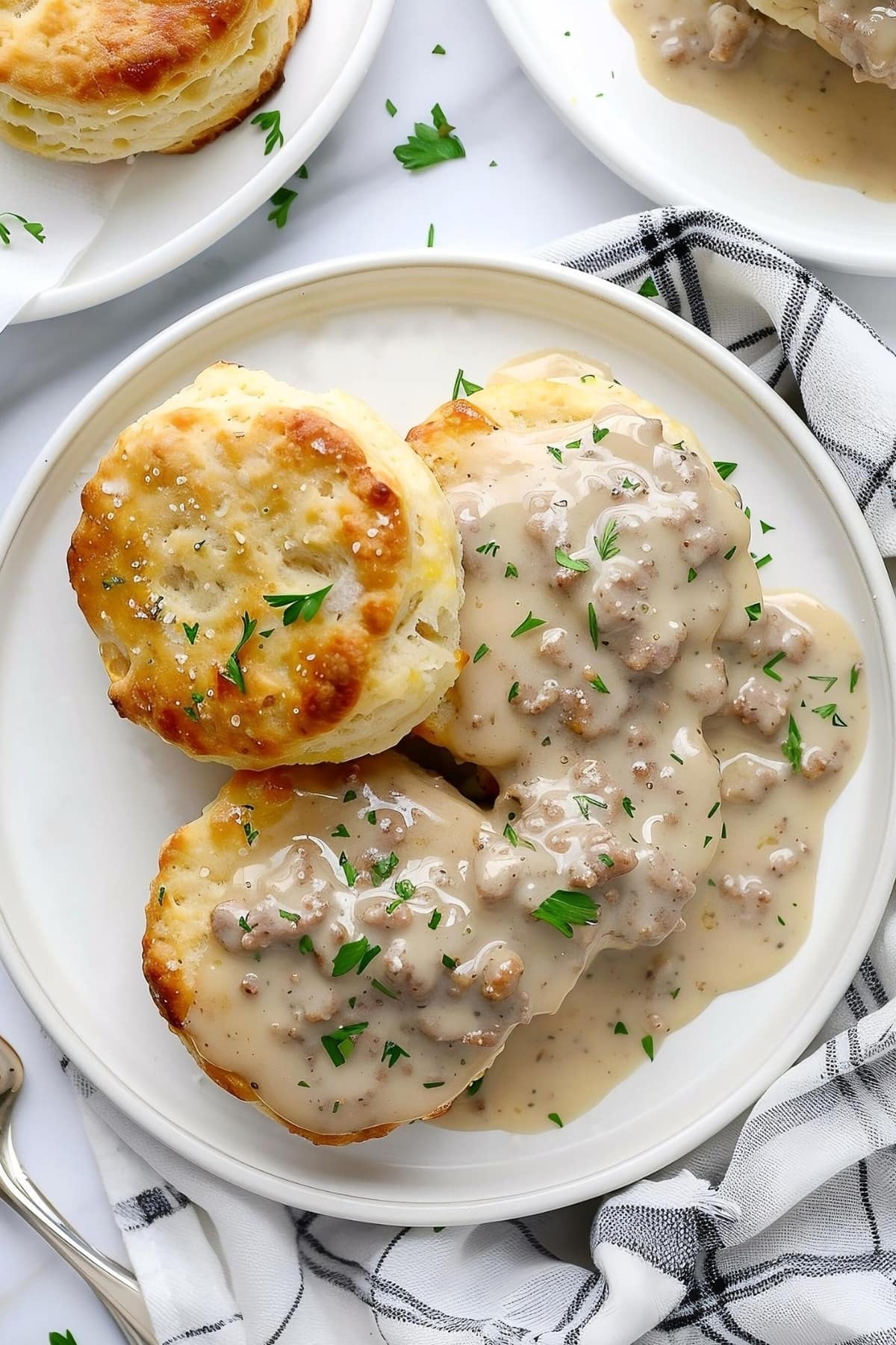 Homemade savory biscuits with sausage gravy