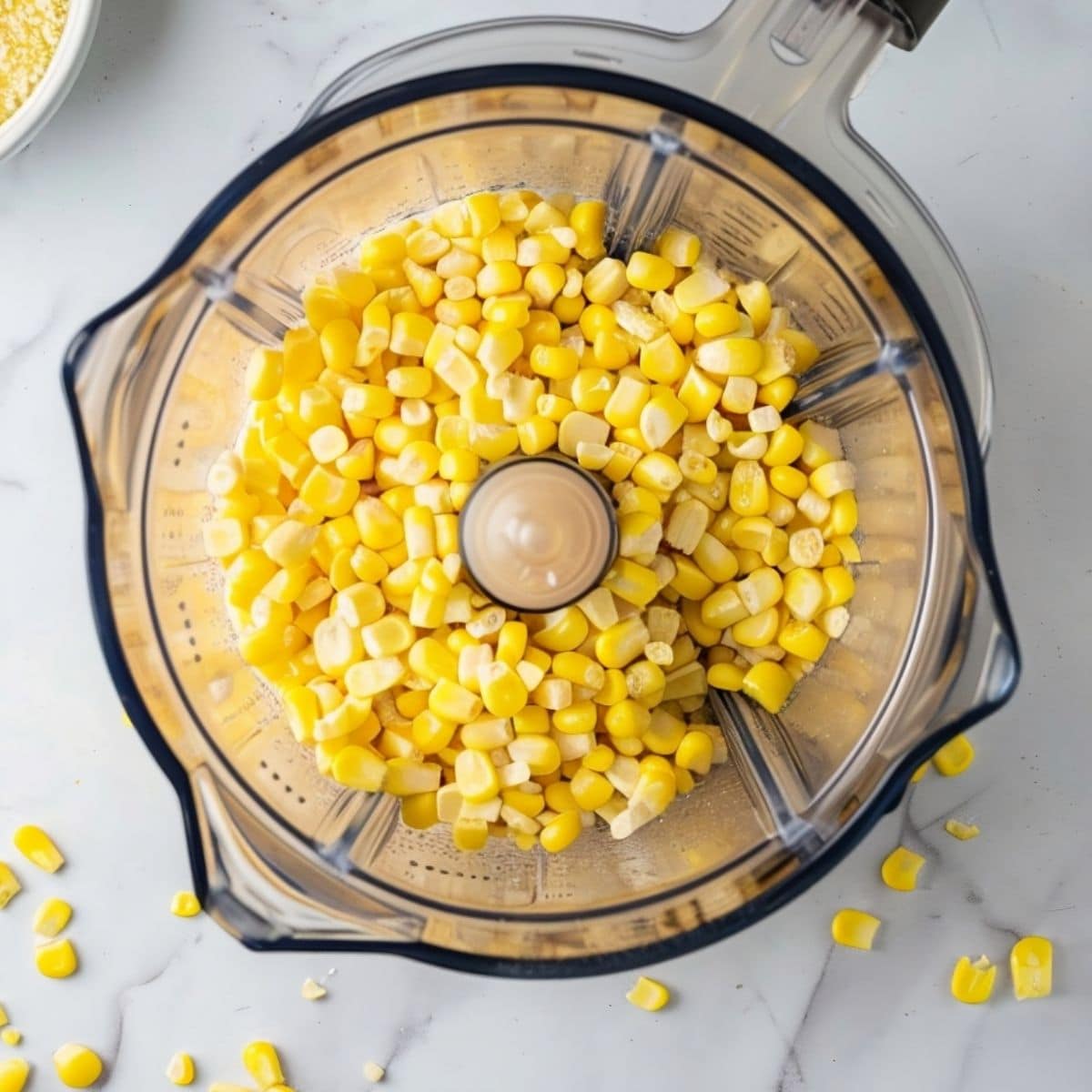 Corn kernels in a blender, overhead view