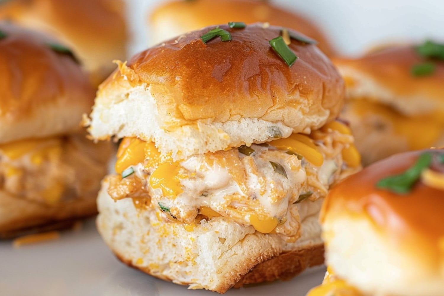Homemade crack chicken sliders with cheese and ranch dressing