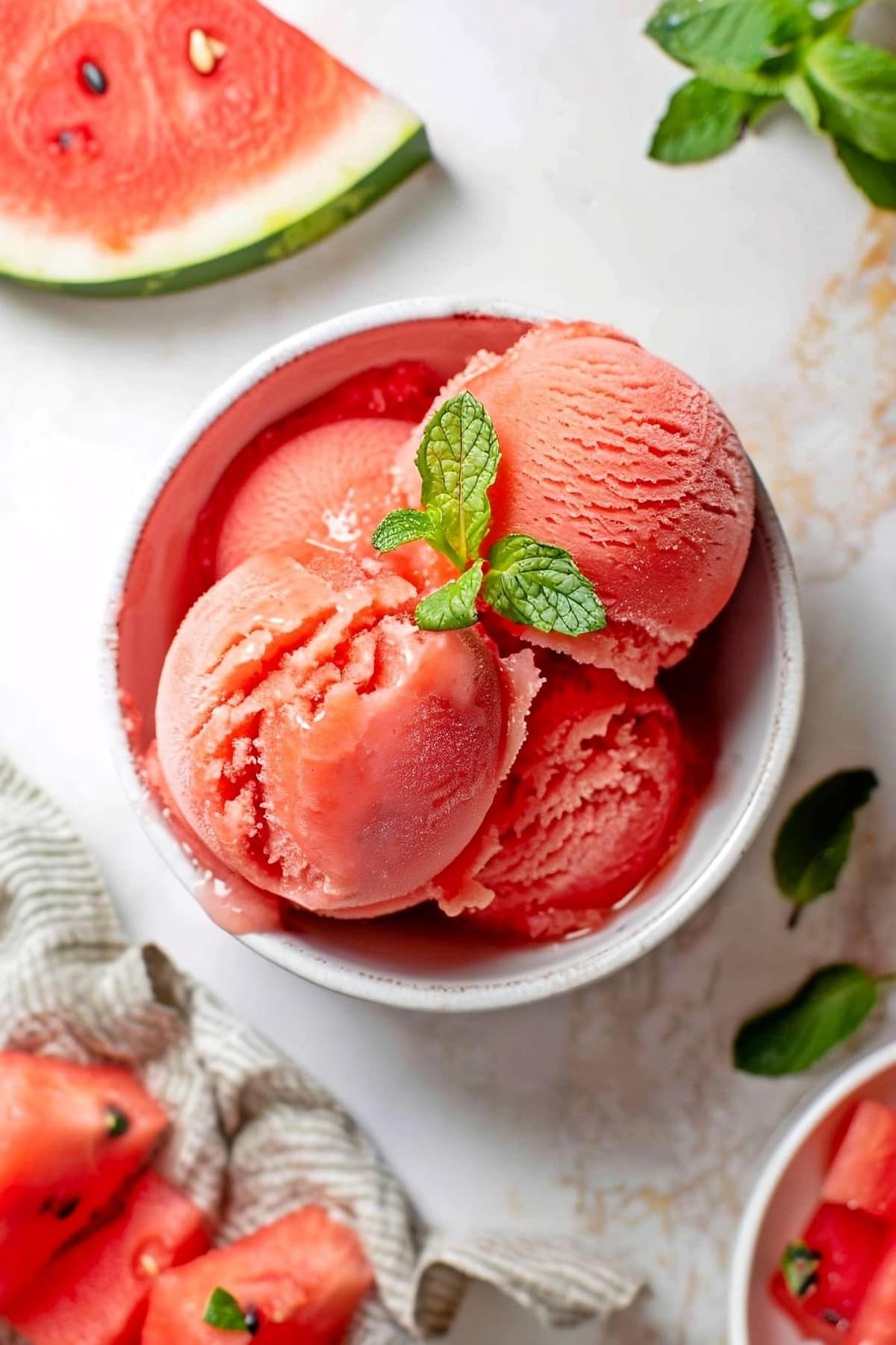 Scoops of homeamde watermelon sorbet with a hint of mint