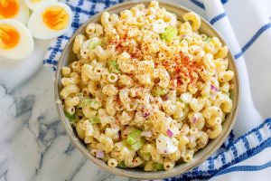 Deviled Egg Pasta Salad - Elbow macaroni coated with creamy dressing and spices