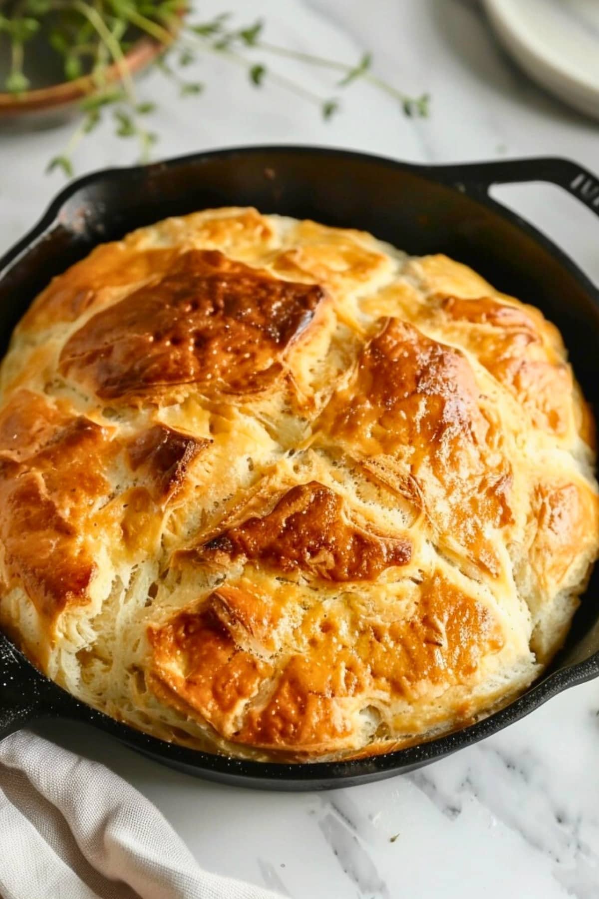 Biscuit bread in a cast iron skillet.