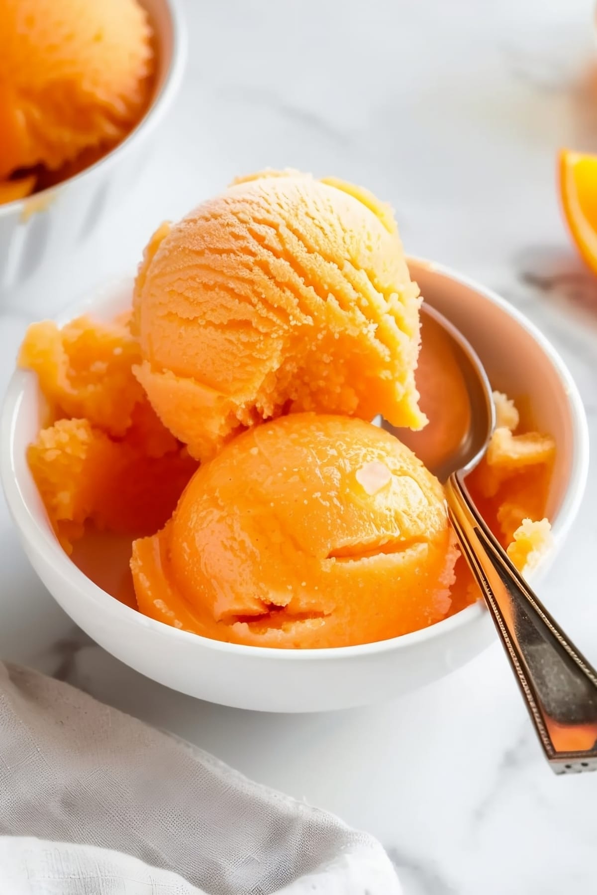 Delightful and citrusy orange sorbet in a bowl