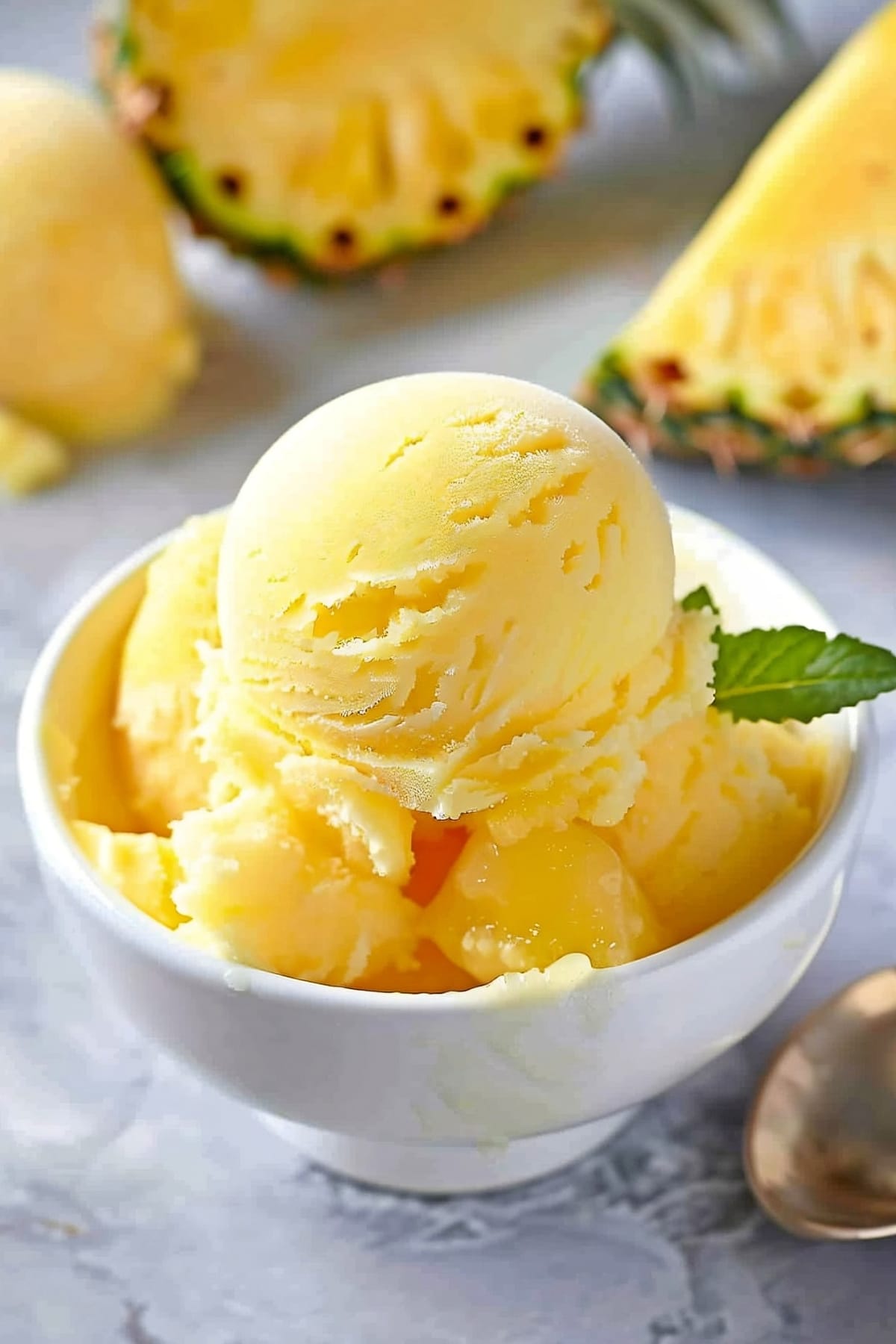 A bowl of bright and refreshing homemade pineapple sorbet